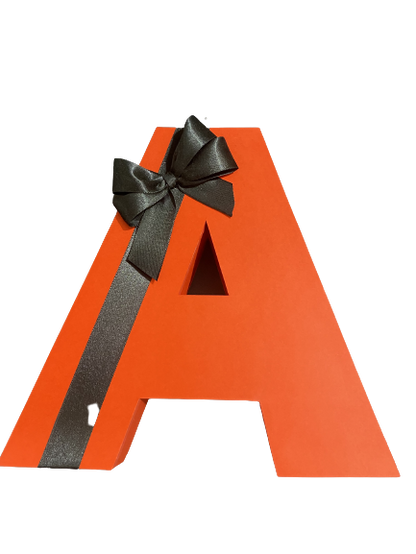 Alphabet box with ribbon